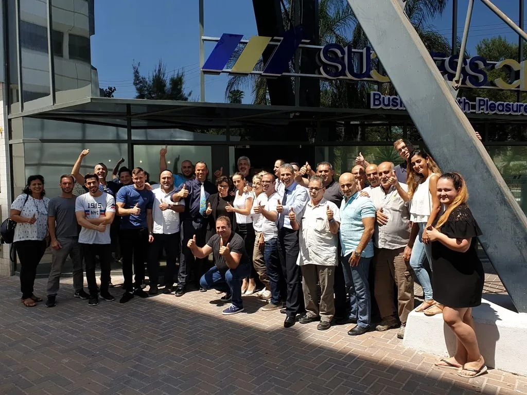 A seminar group celebrating together